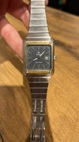 Montre Omega Seamaster carrée acier cadran noir état usagé