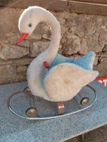 Cygne à bascule et roulettes