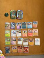 Pokemon Sammelkarten Konvolut mit 2 Dosen und 1 Coin
