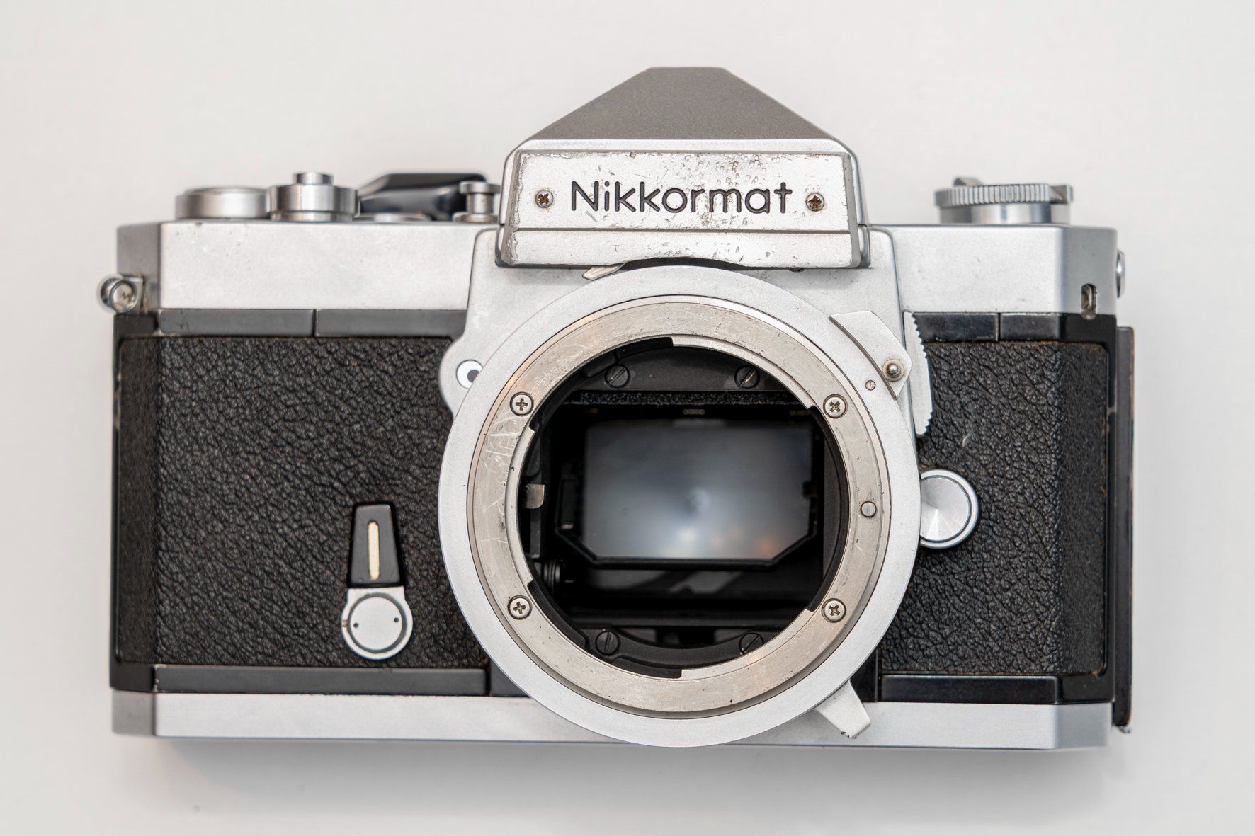 Nikkormat Kamera: Nikkormat + Nikkor 105mm 1:2.5 – Gebraucht aus Grandvaux von RGKeller 4