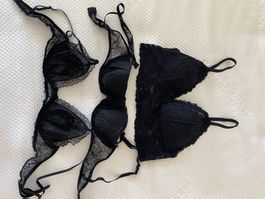 Drei schwarze BHs von H&M