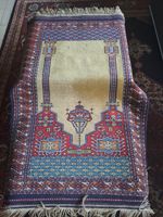 Orientteppich gelb blau rot