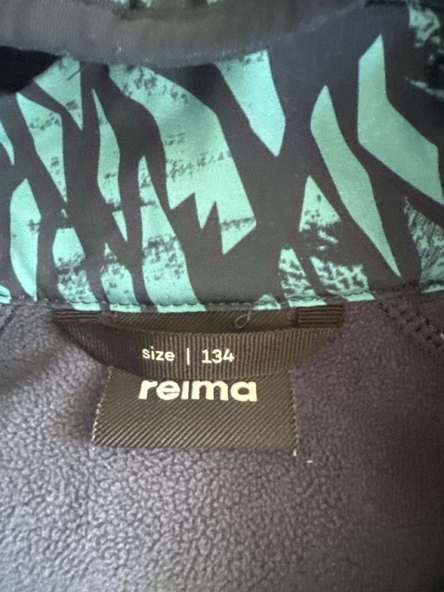 Reima Giacche & Cappotti: Reima Softshelljacke mit Kapuze blau gemustert, Gr. 134 – Usato da Ebikon venduto da thalimann 2