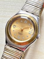 Swatch Damenuhr goldfarben mit Metallarmband 