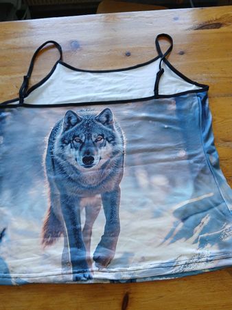 1 debardeur neuf.Taille XXL