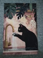 Affiche décorative chat noir lavant les pattes 