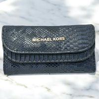 Grand portefeuille Michael Kors en cuir bleu effet python