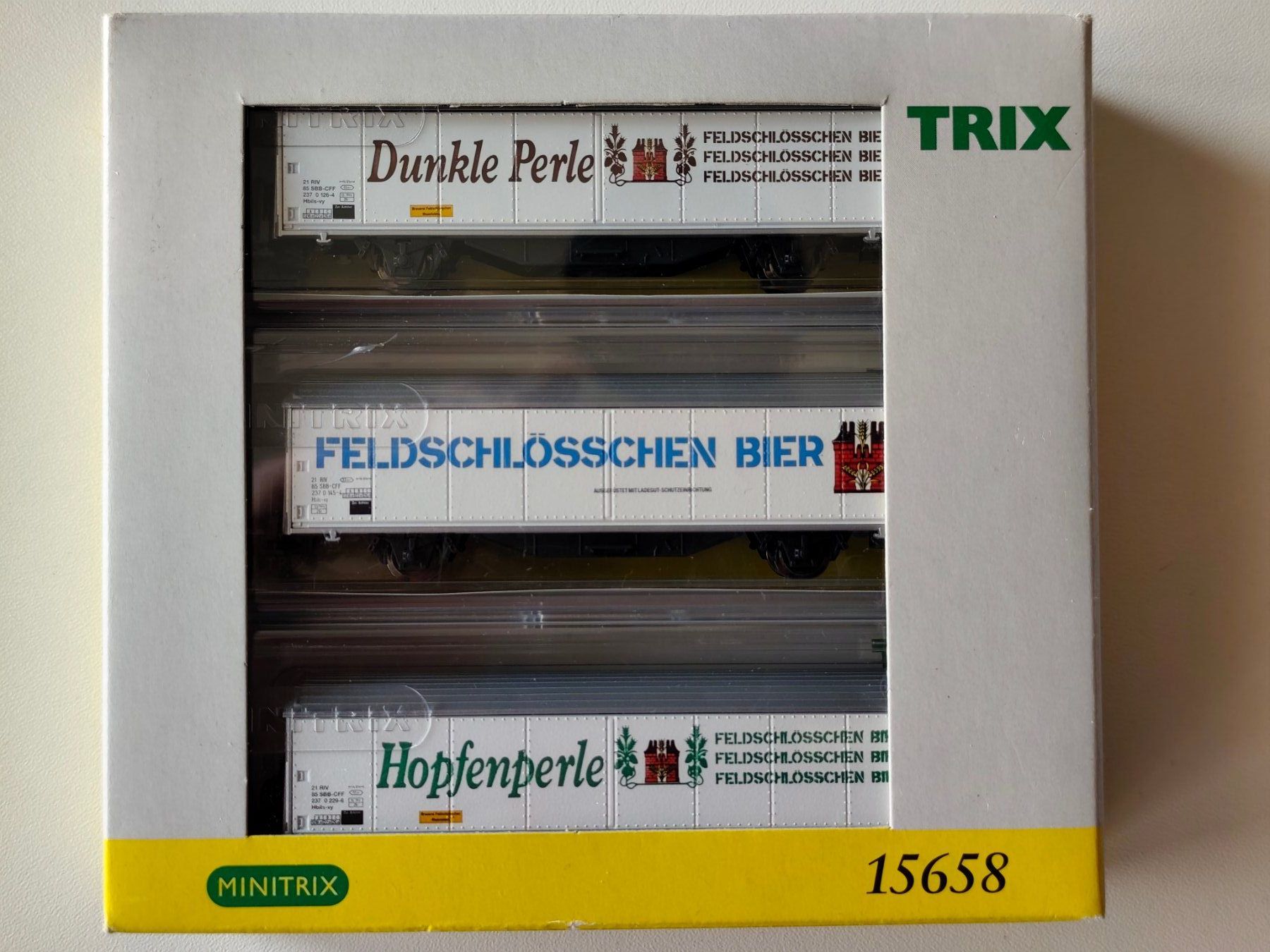 Trix Modellini di ferrovie: 3 "Feldschlösschen" Bierwagen der SBB von Minitrix N – Nuovo e nell'imballaggio originale da La Chaux-de-Fonds venduto da Sekado