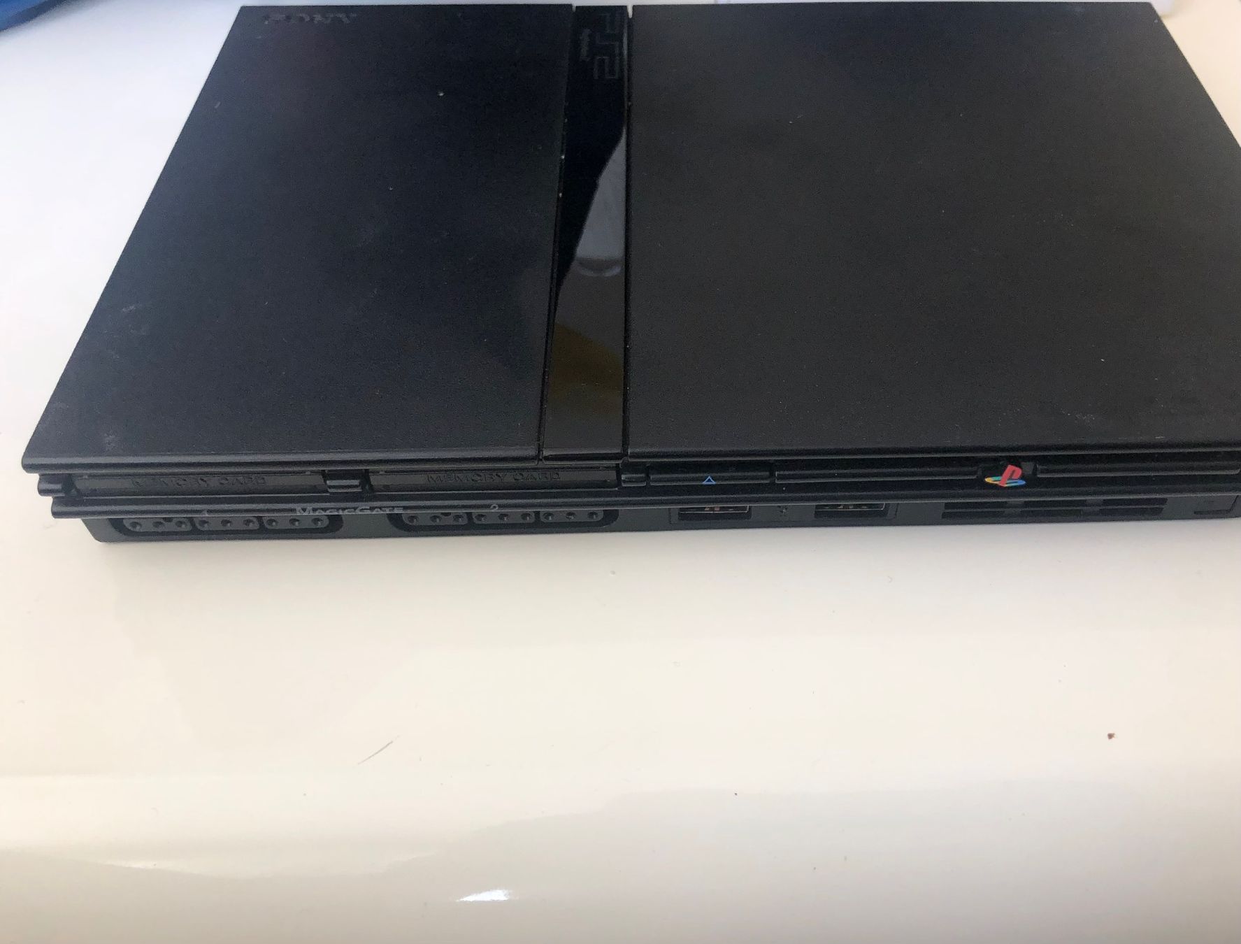 Sony Console: PS2 slim avec jeux/ 2 manettes – Usato da Cugy VD venduto da oth_7btj 1