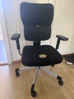 Chaise de bureau ergonomique, état usé mais confortable!