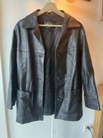 Veste en cuir noir vintage sur mesure, idéal pour l'automne!