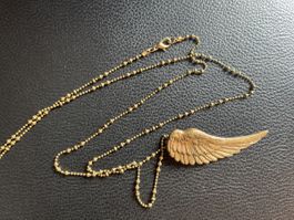 Gold coloured angel wing necklace