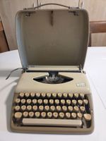 Triumph Tippa tragbare Schreibmaschine mit Koffer