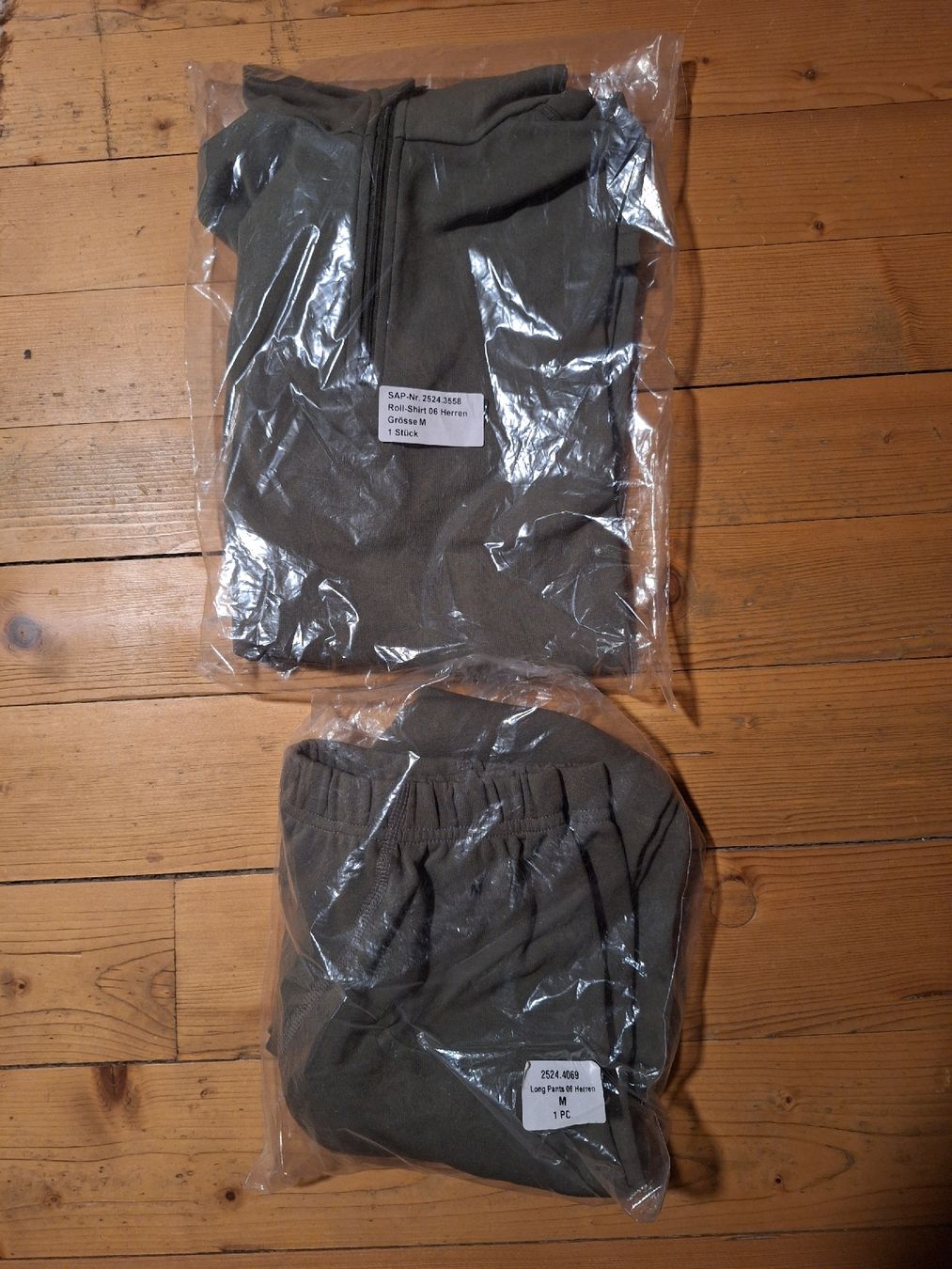 Schweizer Armee Pantaloni: ArmeeKnägi+Thermohosen Lang – Nuovo e nell'imballaggio originale da Donat venduto da Lacvers