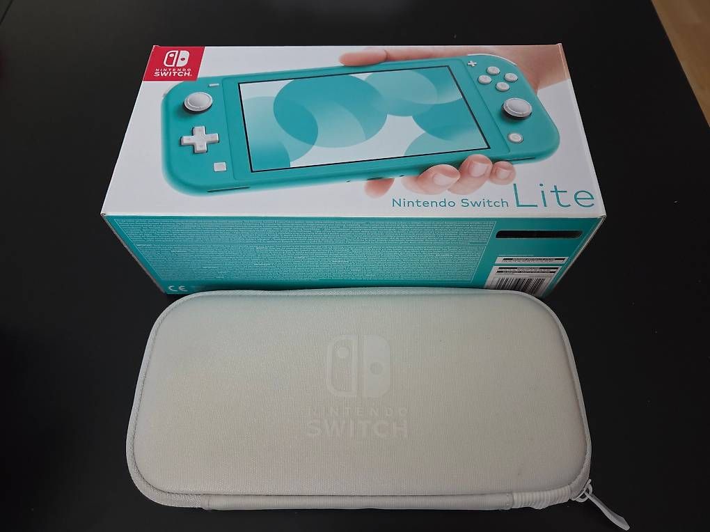 Nintendo Consoles: Nintendo Switch Lite - Türkis mit Reisecover – D'occasion à Vilters par oOLinkOo