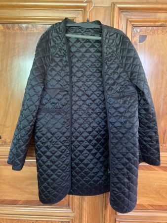 Un dessous de veste matelassée noire