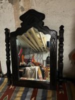 Spiegel in orientalischem Holzrahmen
