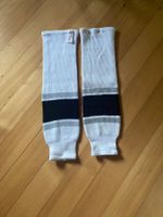 Paire de guêtre pour hockey / jamais utilisée