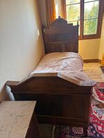 Letto singolo in legno massiccio con rotelle (con materasso)