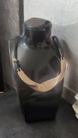 Collana donna metallo color oro e cordino nero