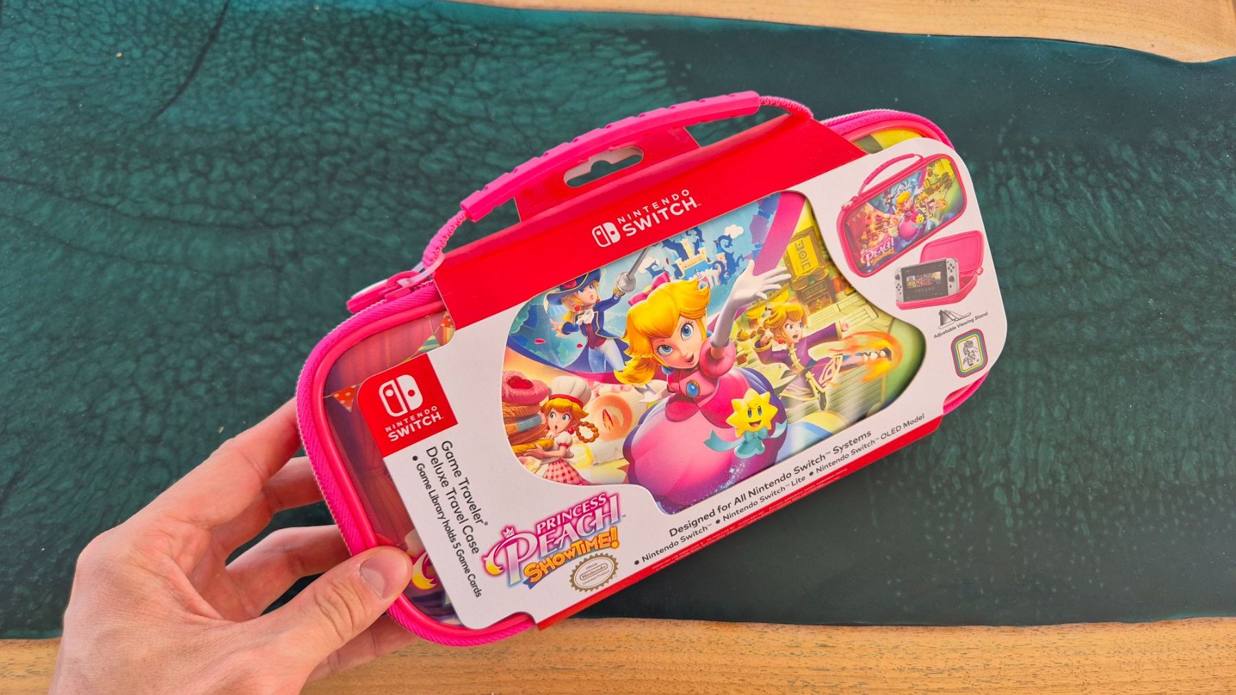 Nintendo Custodie protettive: Nintendo Switch Princess Peach Etui – Nuovo e nell'imballaggio originale da Lyss venduto da SDC16 1