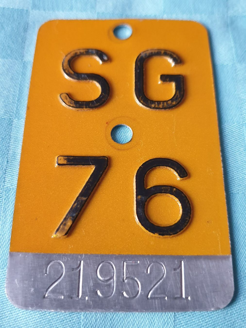 Insegne: Velonummer SG 76 gelb – Usato da Mörschwil venduto da spirspi