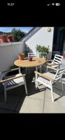 Tisch mit 4 Stühlen
