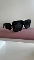 Stylische, schwarze Sonnenbrille mit speziellem Detail, NEU