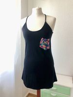 Minikleid schwarz mir bunten Taschenaufnäher
