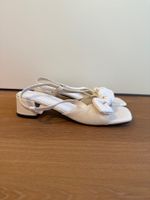 Elegante weisse Sandalen mit Schleife -