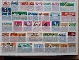 66 Schweizer Briefmarken mit Stempel " Zürich"