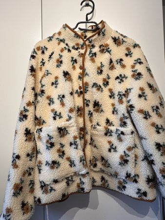 Veste polaire à motifs floraux beige bon état
