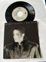 Michael Jackson. 1992.  Who Is It / Rock With You