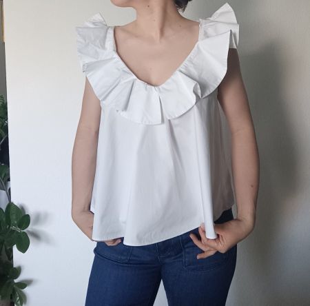 100% cotton - White Zara top with ruffles on the shoulders