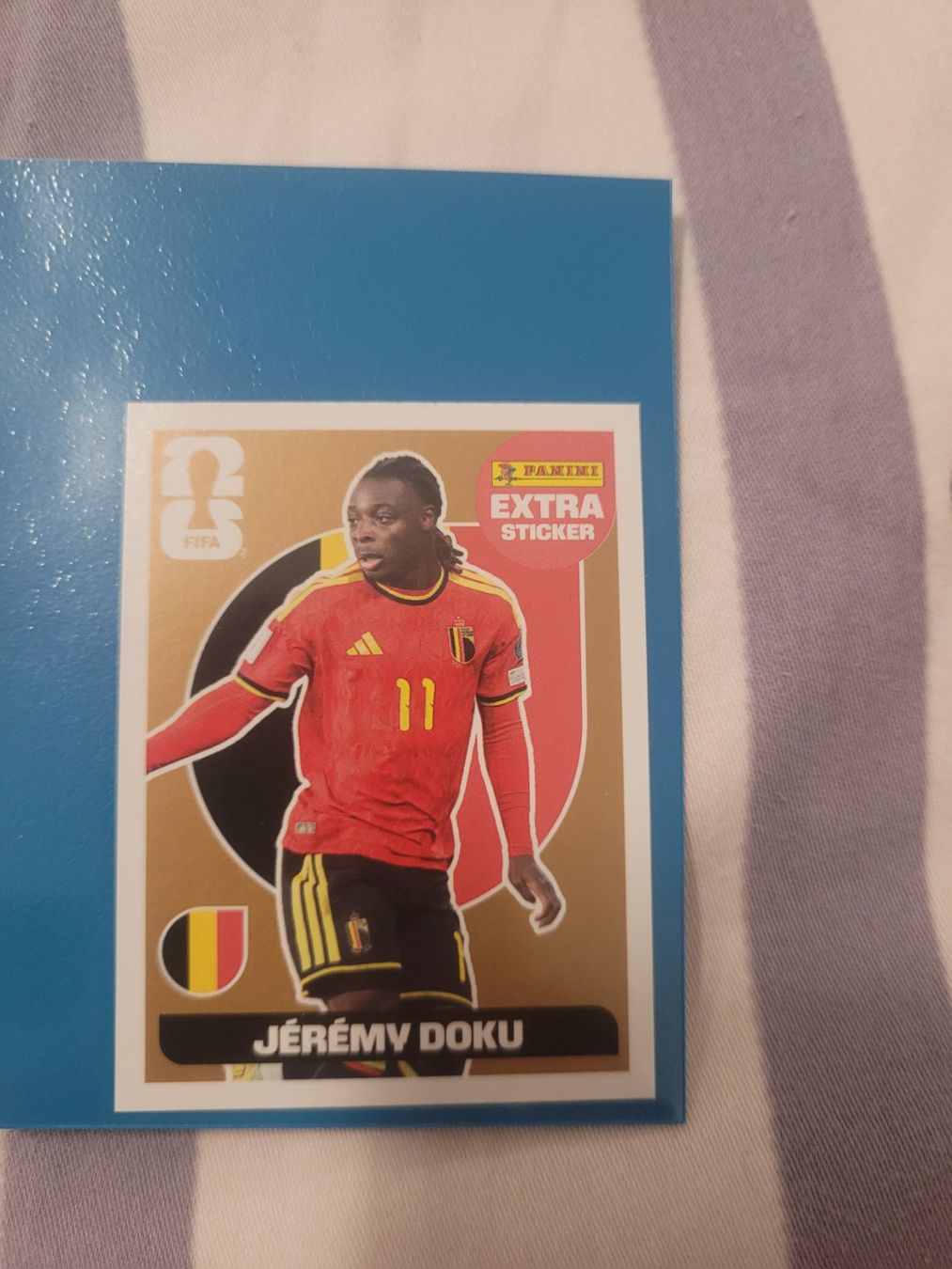 Panini Cartes à collectionner: Jérémy Doku Bronze Extra Sticker – Neuf (Voir description) à Martigny par sil_ht2d