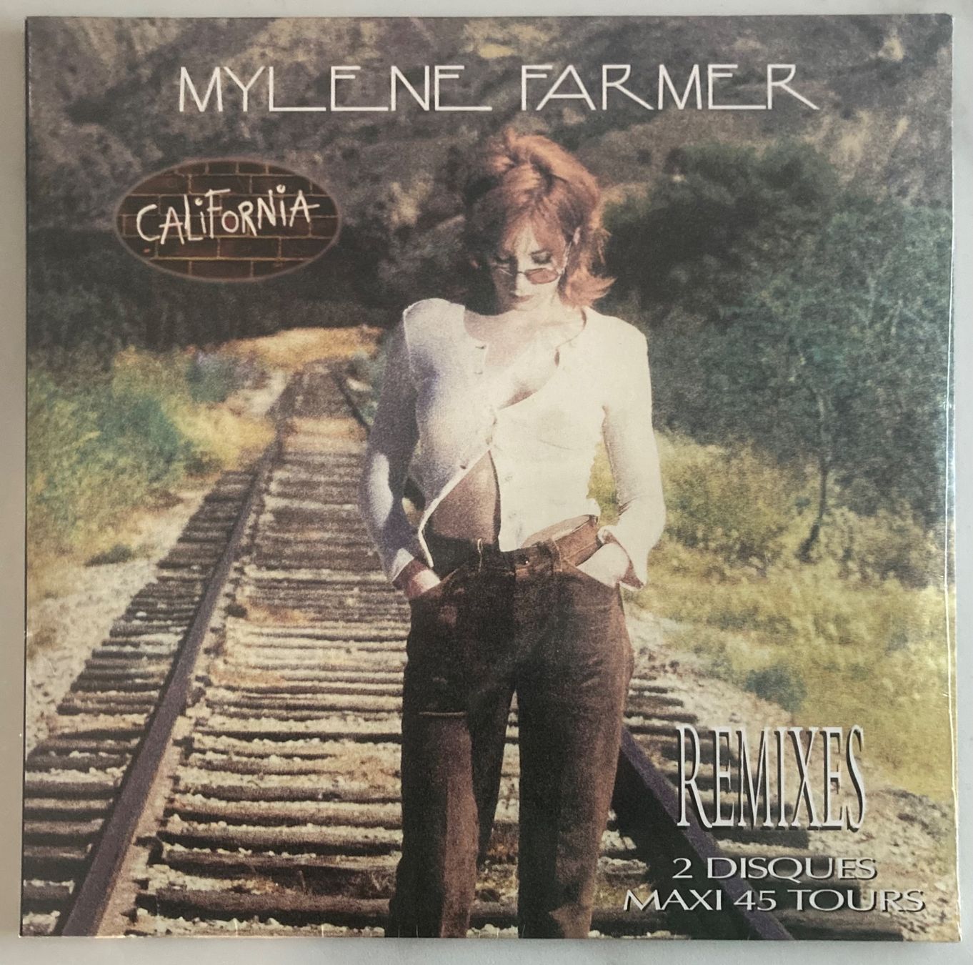 Dischi in vinile: MYLÈNE FARMER - CALIFORNIA – Nuovo e nell'imballaggio originale da Poliez-Pittet venduto da Newtown-Records