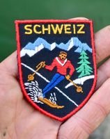 VINTAGE Badge SCHWEIZ - ST. GALLER STICKEREI skifahrer