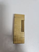 Dunhill Feuerzeug goldfarben mit Muster, gebrauchter Zustand