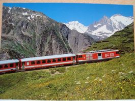 FO Furka-Oberalp-Bahn auf dem Oberalp-Pass mit dem Sustenhor