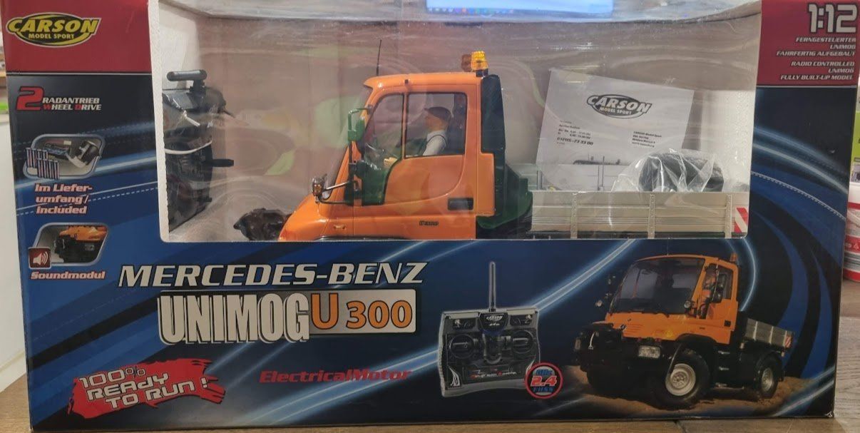Unimog Modellini d'auto: Unimog U300 mit Seilwinde M: 1:12 Model – Nuovo e nell'imballaggio originale da Meggen venduto da baerli1976
