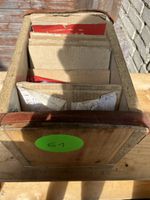 Holzkiste mit Kreissageblätter etc.