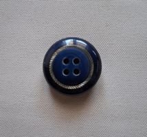 Knopf dunkelblau mit silberfarbenen Muster, 23 mm.