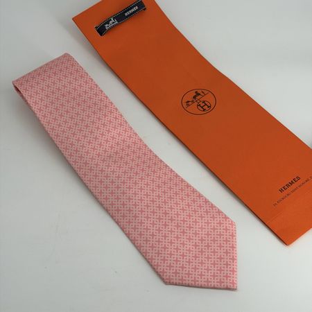 Cravate Hermès Paris 100% soie rose motif géométrique