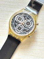 Swatch Chronograph Uhr transparent Gehaeuse schwarzes Ziffer