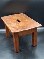 Antiker,rustikaler Fusshocker dunklem Holz niedriger Hocker