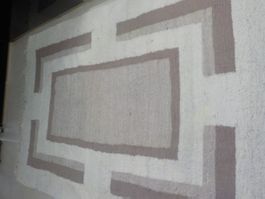 einen Wollteppich aus Südafrika, Handgefertigt