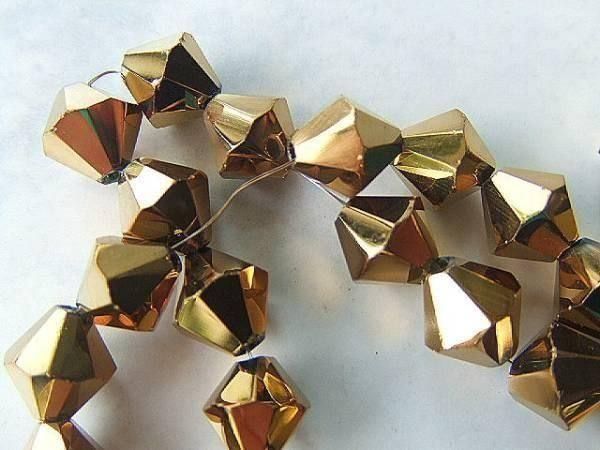 Perle (finte): 10 Glasschliffperlen bicone  10mm gold – Nuovo (secondo la descrizione) da Alpnachstad venduto da perlengaby