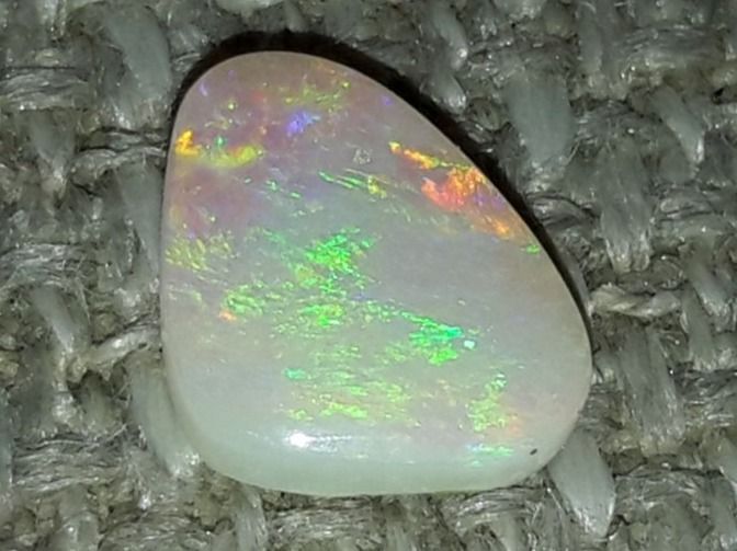Pietre preziose: Australischer Flashfire Opal 0.47ct – Nuovo e nell'imballaggio originale da Uerkheim venduto da Winwinner 1