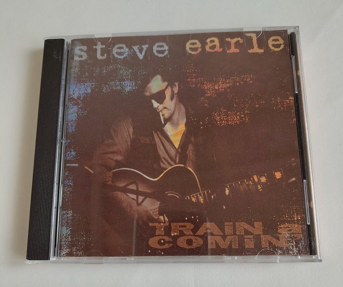 CDs: CD Steve Earle - Train a Comin' – D'occasion à Buchs ZH par Bighusky