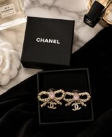 CHANEL BEAUTÉ Bow Earrings Rosa Stein & Strass